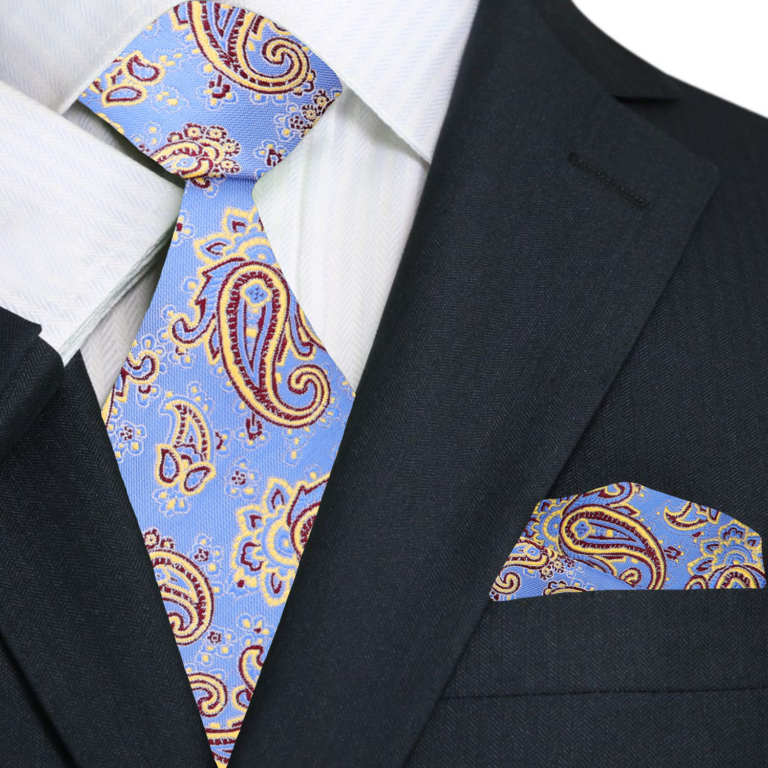 Black suit with a blue paisley tie and matching pocket square