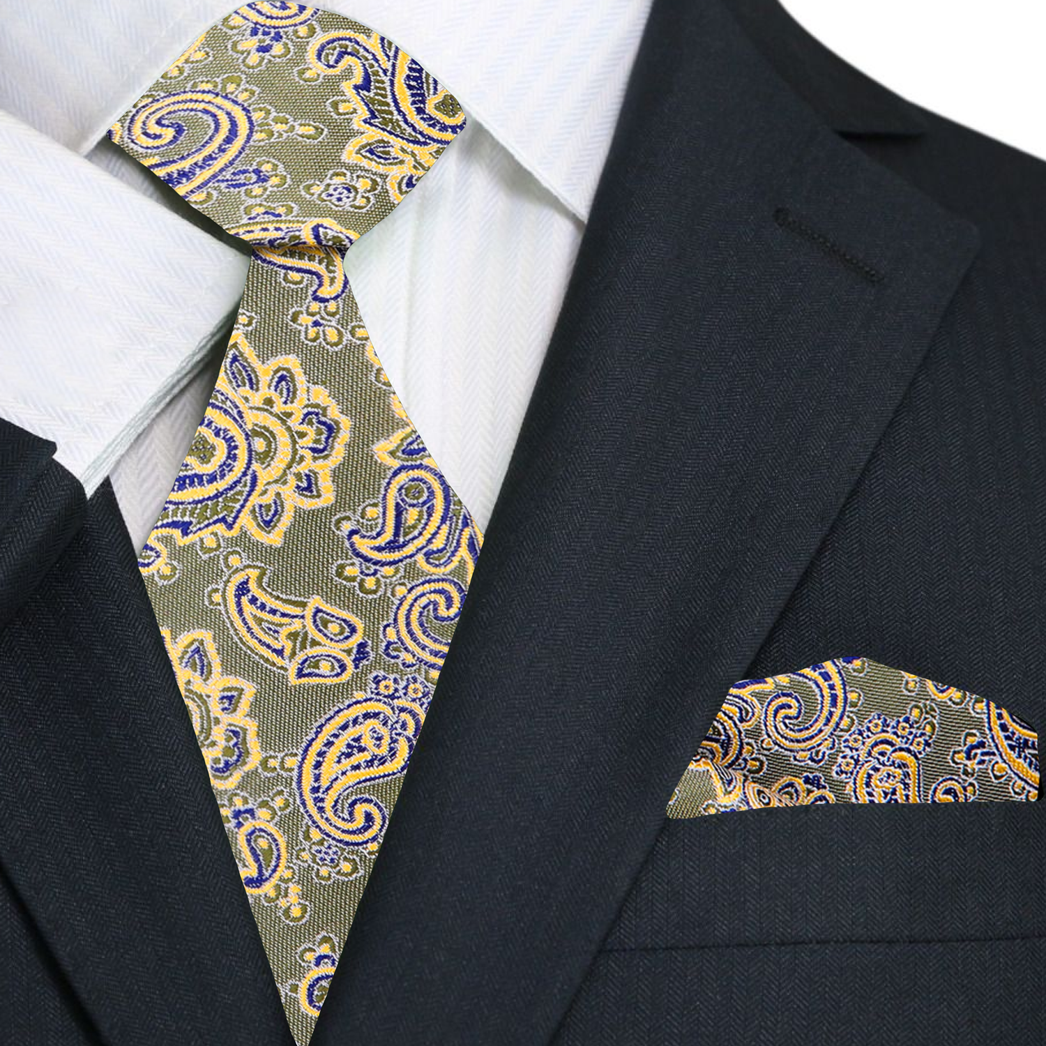Green paisley tie and pocket square set on a black suit jacket.