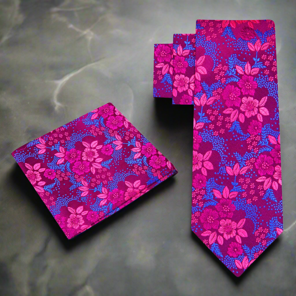 a pink and blue floral tie and square