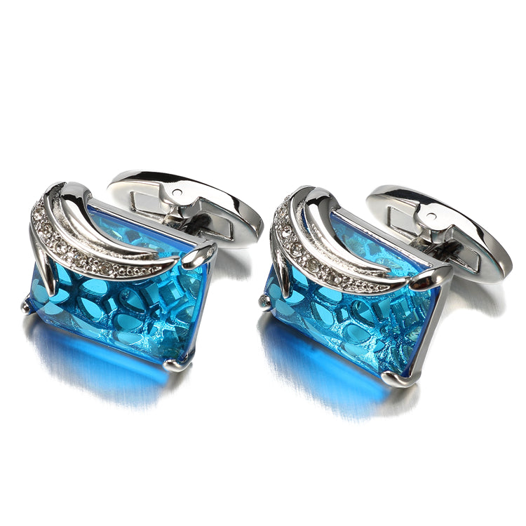 A Silver Colored with Clear and Blue Gemstones Cuff-links.