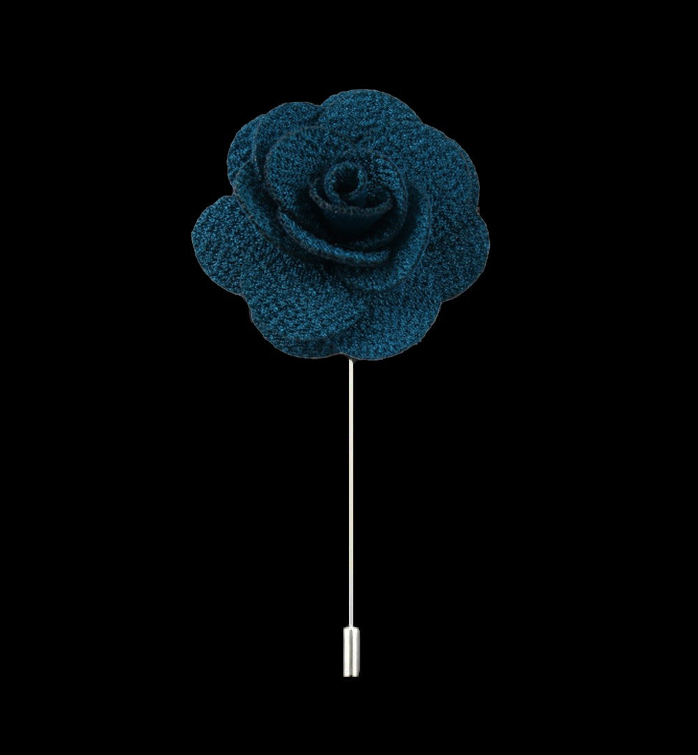 A Deep Teal Colored Lapel Flower