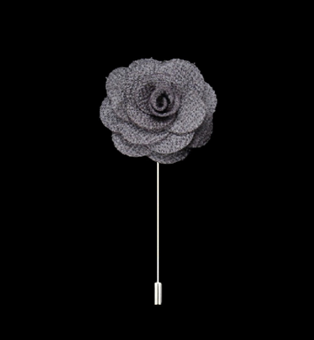 A Grey Colored Lapel Flower