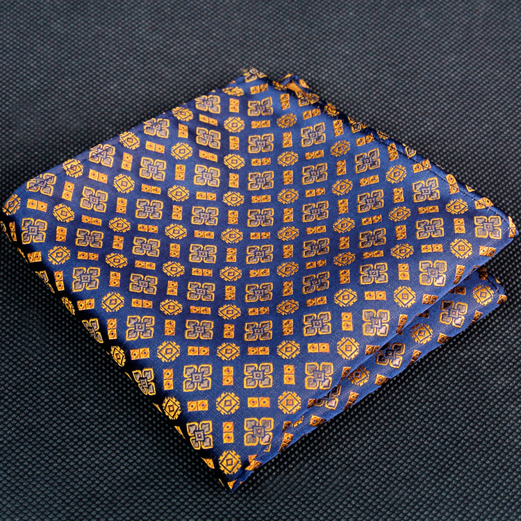 A Dark Blue, Copper Abstract Large Crest With Small Burst and Checks Pattern Silk Pocket Square