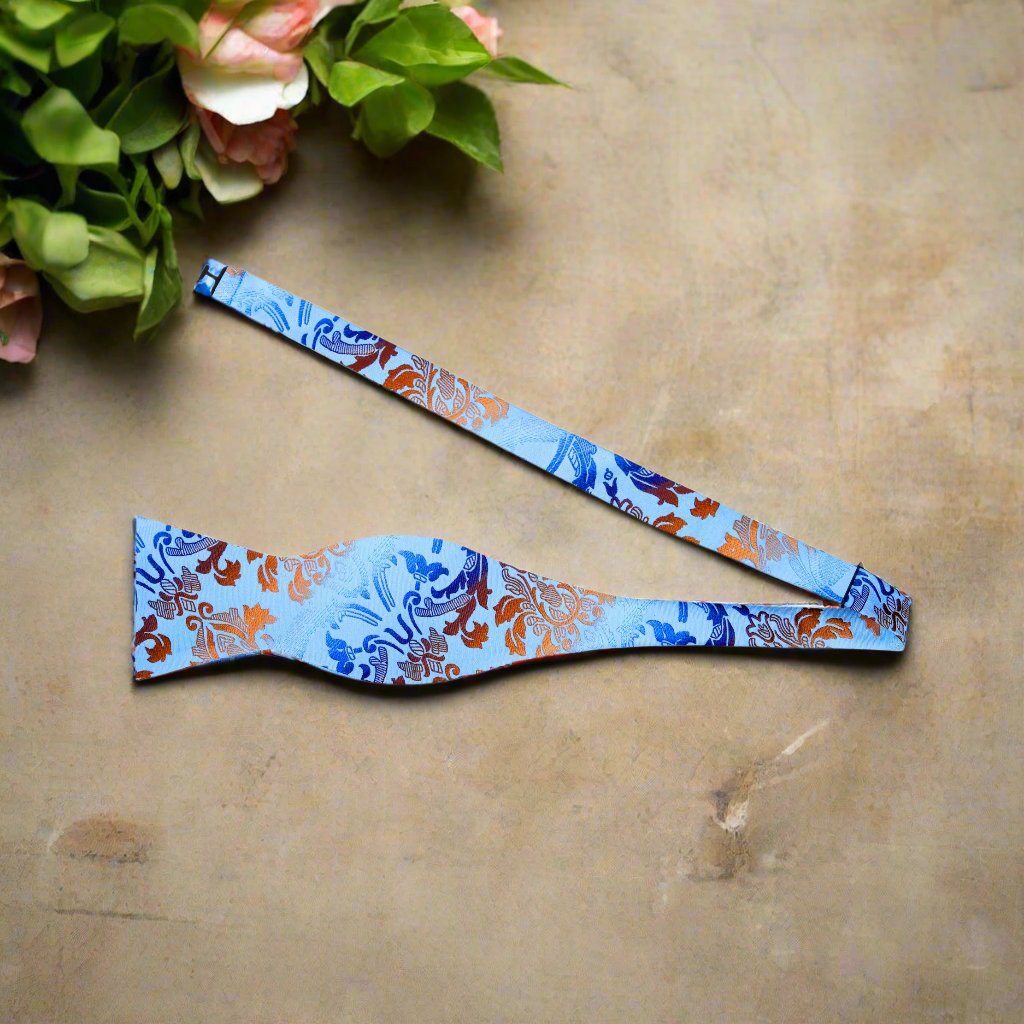 A Light Blue, Blue, Brown Floral Pattern Silk Self Tie Bow Tie Untied