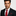 Red Necktie and Accenting Square on Man Wearing Suit
