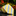 Yellow tie with blue and white stripes on a reflective surface with flowers in the background