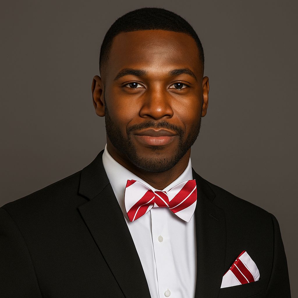 Man wearing a black suit with a red and white stripe bow tie and pocket square on a brown background