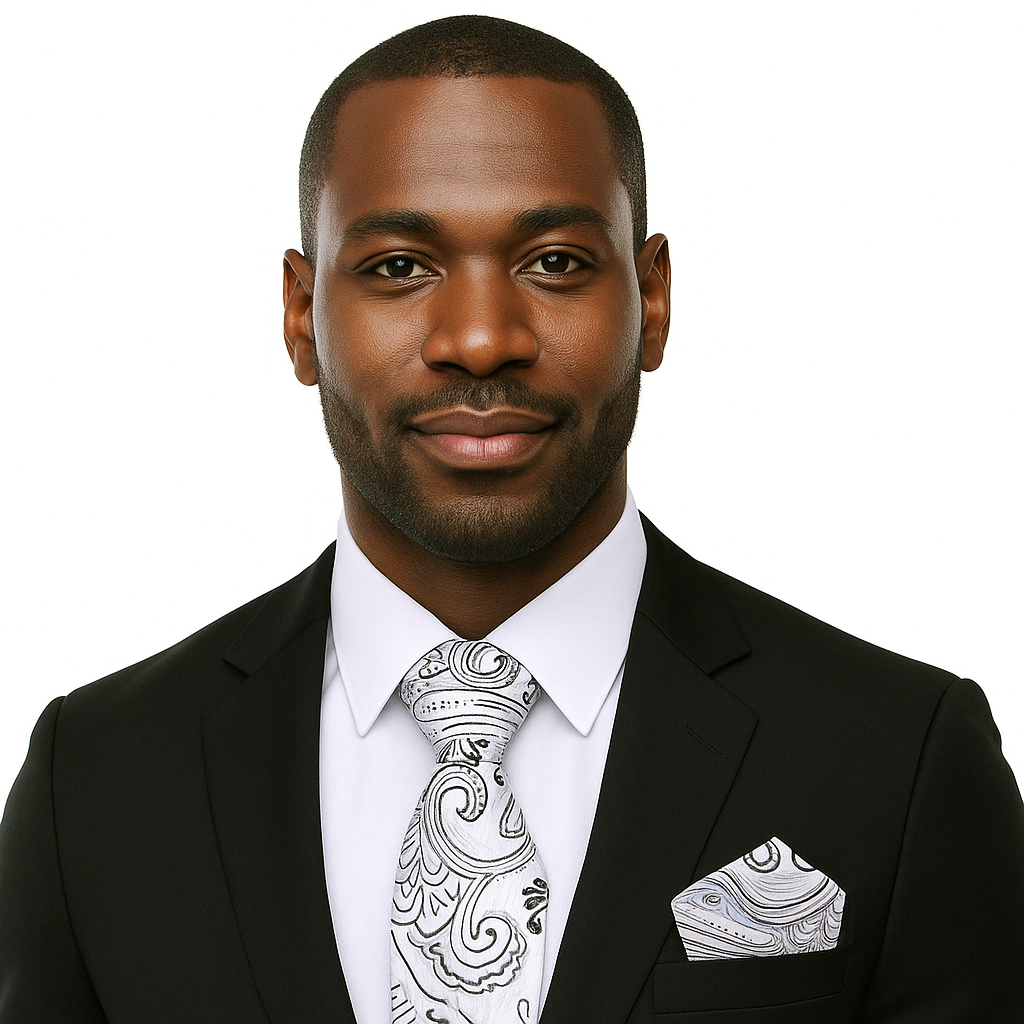 Man Wearing a Suit with a Light Grey, Black Paisley Necktie and Matching Square