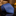 Blue checkered tie on a reflective surface with blurred background