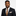 Man Wearing Black Suit with Brown Black Paisley Necktie and Beige Square 2
