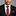 Burgundy, White Polka Tie and Square on Man Wearing Black Suit and White Shirt