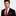 Man Wearing a Black Suit with Red, White Polk Tie and Square