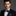 Man wearing a black suit with a Purple Geometric Bow Tie and Square||Purple