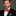 Man wearing Red, White and Green Candy Cane Bow Tie and Accenting Pocket Square