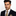 Brown and caramel stripe necktie and brown Square on man wearing suit