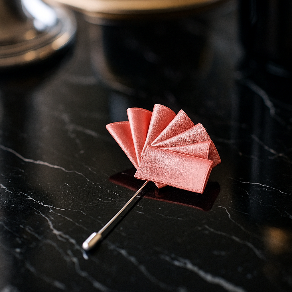 Pink pocket square on a black surface