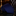 Rolled-up blue tie with a subtle pattern on a dark surface