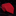Red tie rolled up on a black marble surface