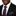 Man wearing a black suit with a blue tie and pocket square featuring orange polka dots.