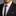 Man wearing a black suit with a colorful tie and pocket square against a gray background