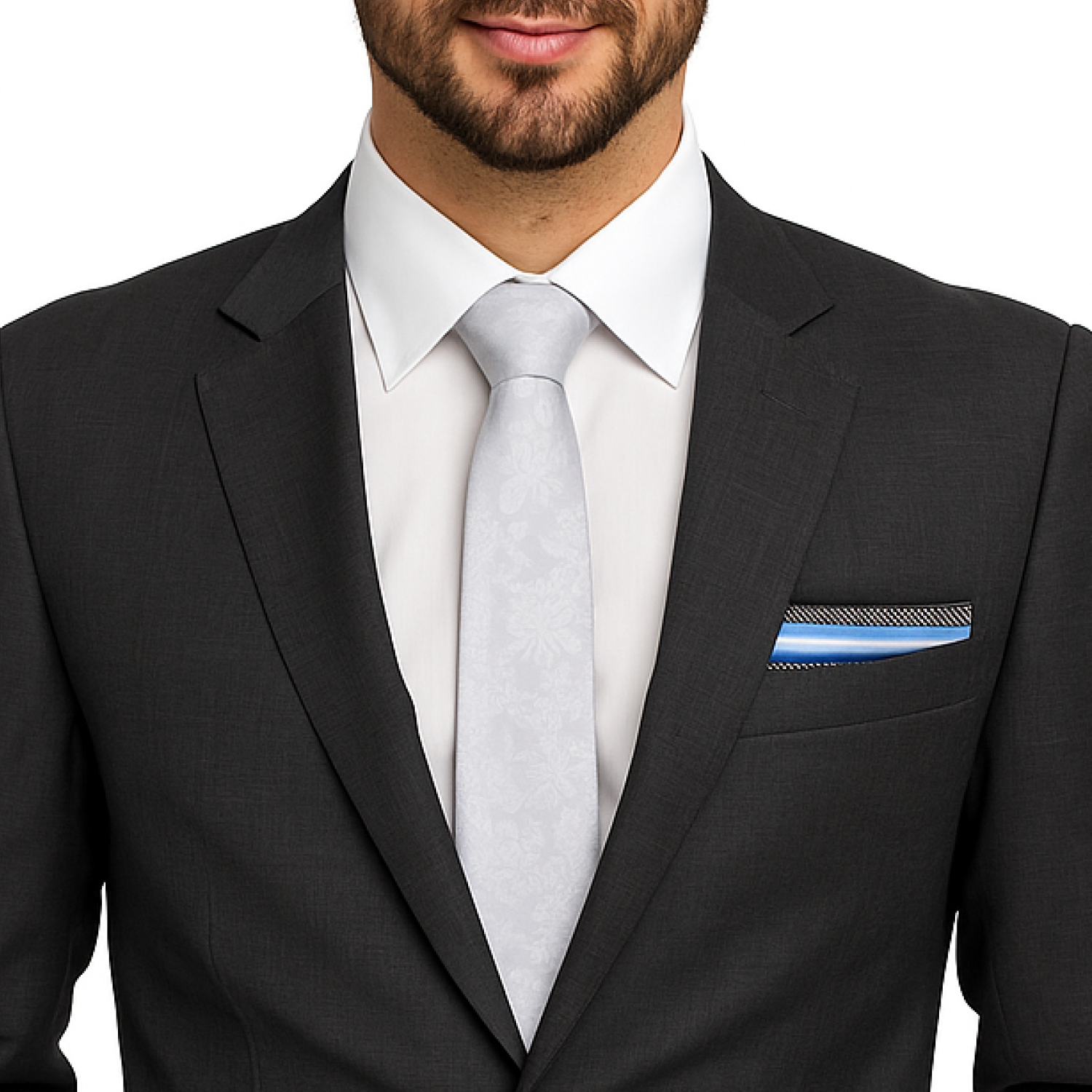 Man wearing a black suit with a white shirt and light gray tie, close-up of chest and jacket pocket.