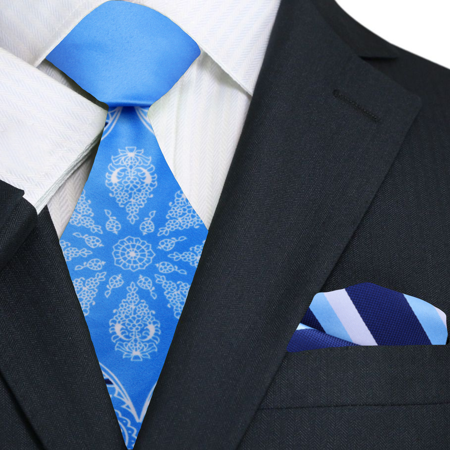 Blue patterned tie and stripe pocket square with a black suit jacket.