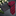 Alt: Red and black striped tie with accenting black and red polka pocket square