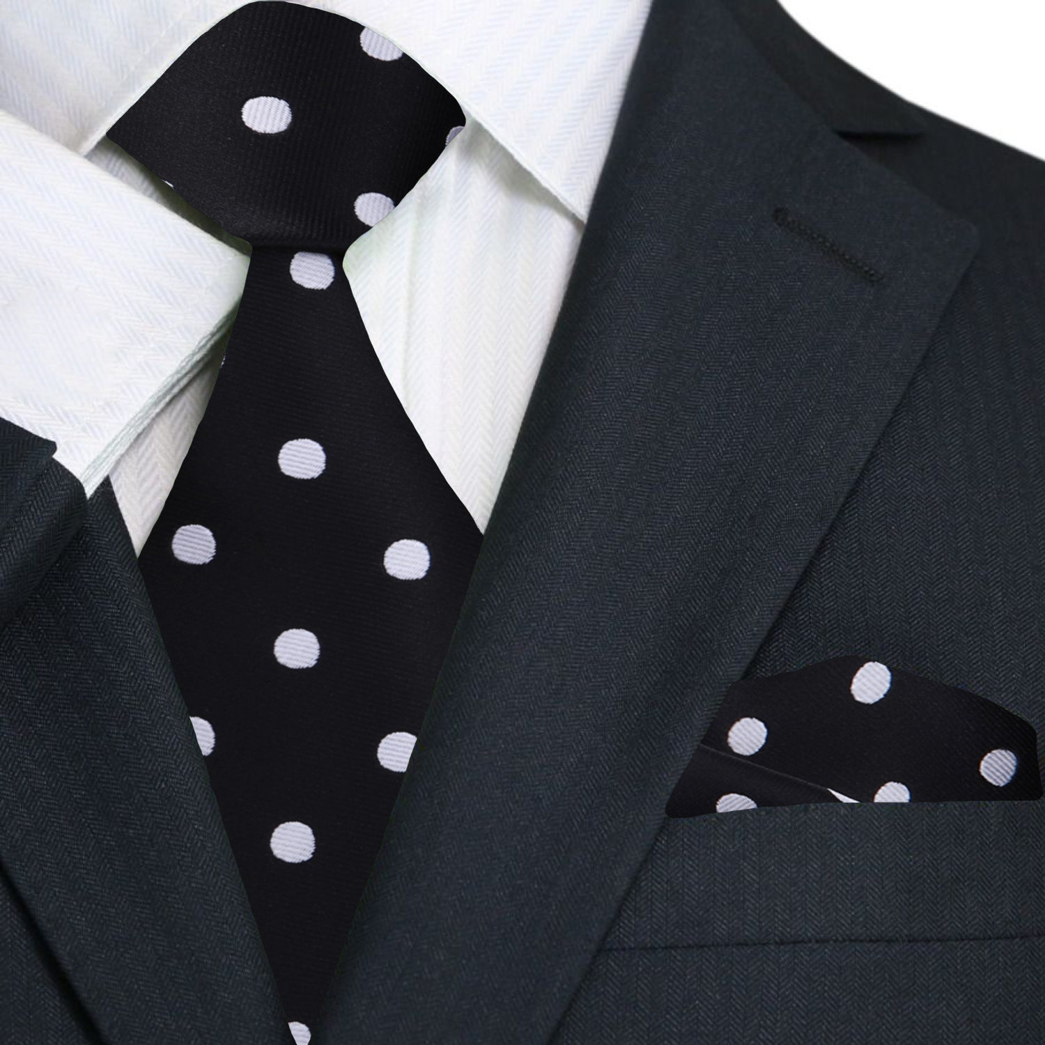 Black suit with a black tie and pocket square featuring white polka dots.