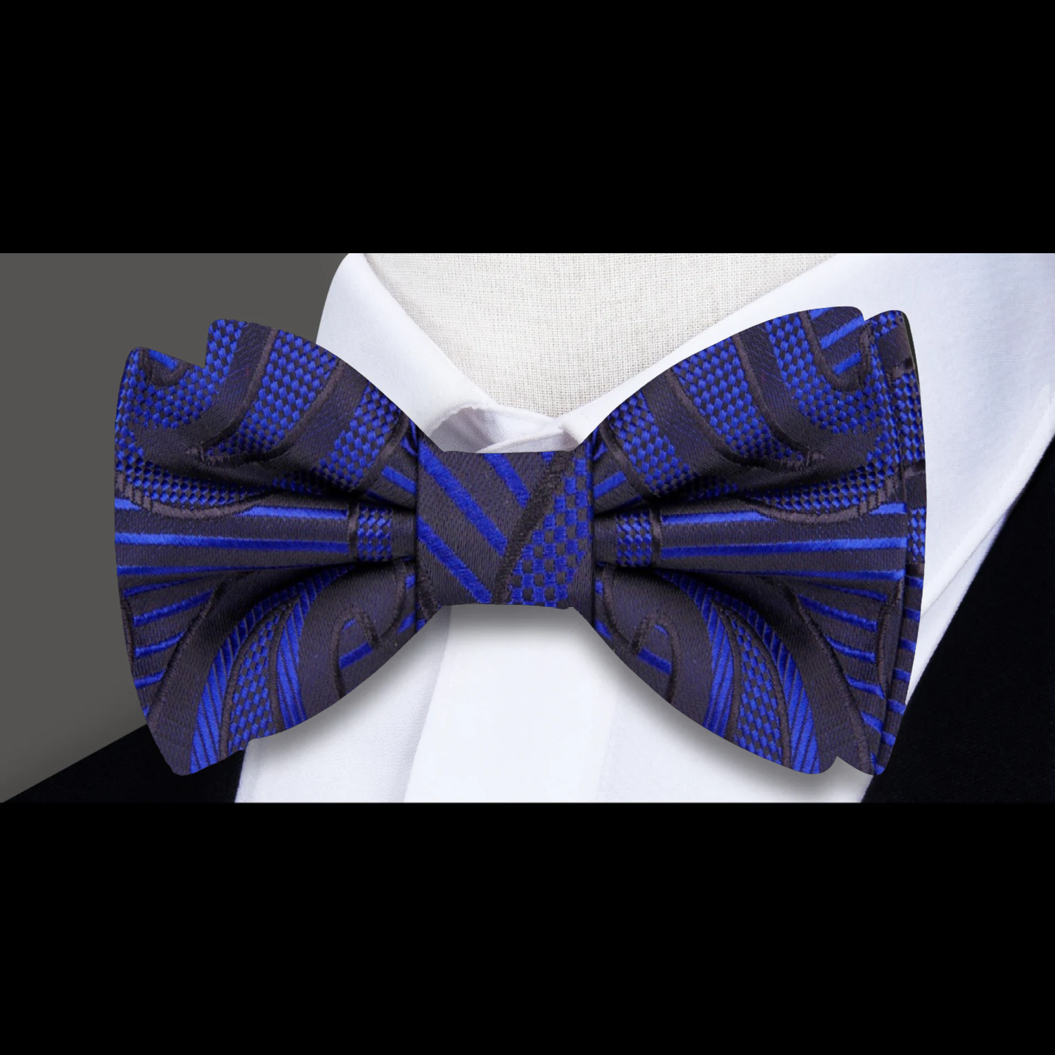 A Blue, Light Blue, Black Paisley Pattern Silk Self Tie Bow Tie