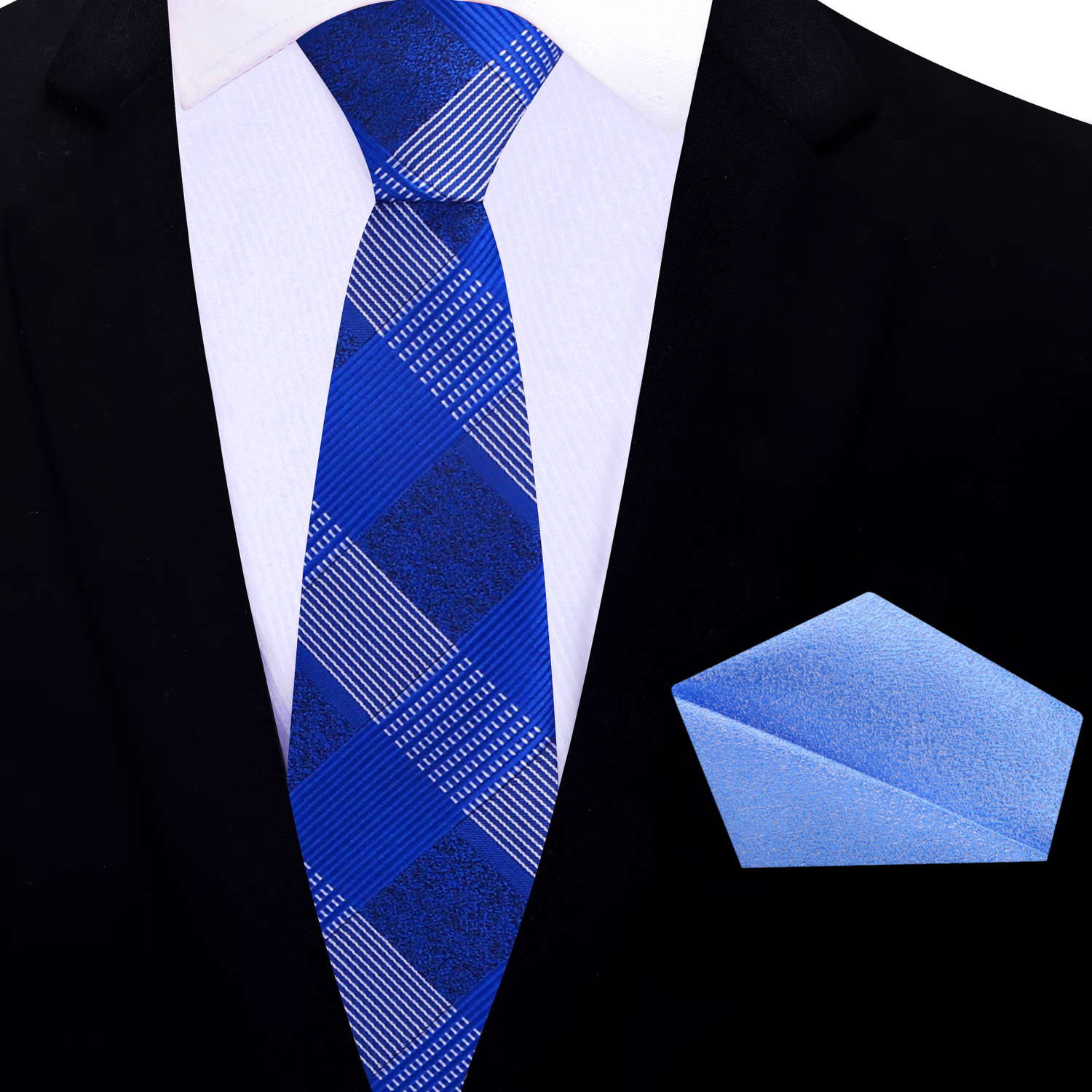 Blue patterned plaid thin tie and light blue pocket square on a black suit jacket.