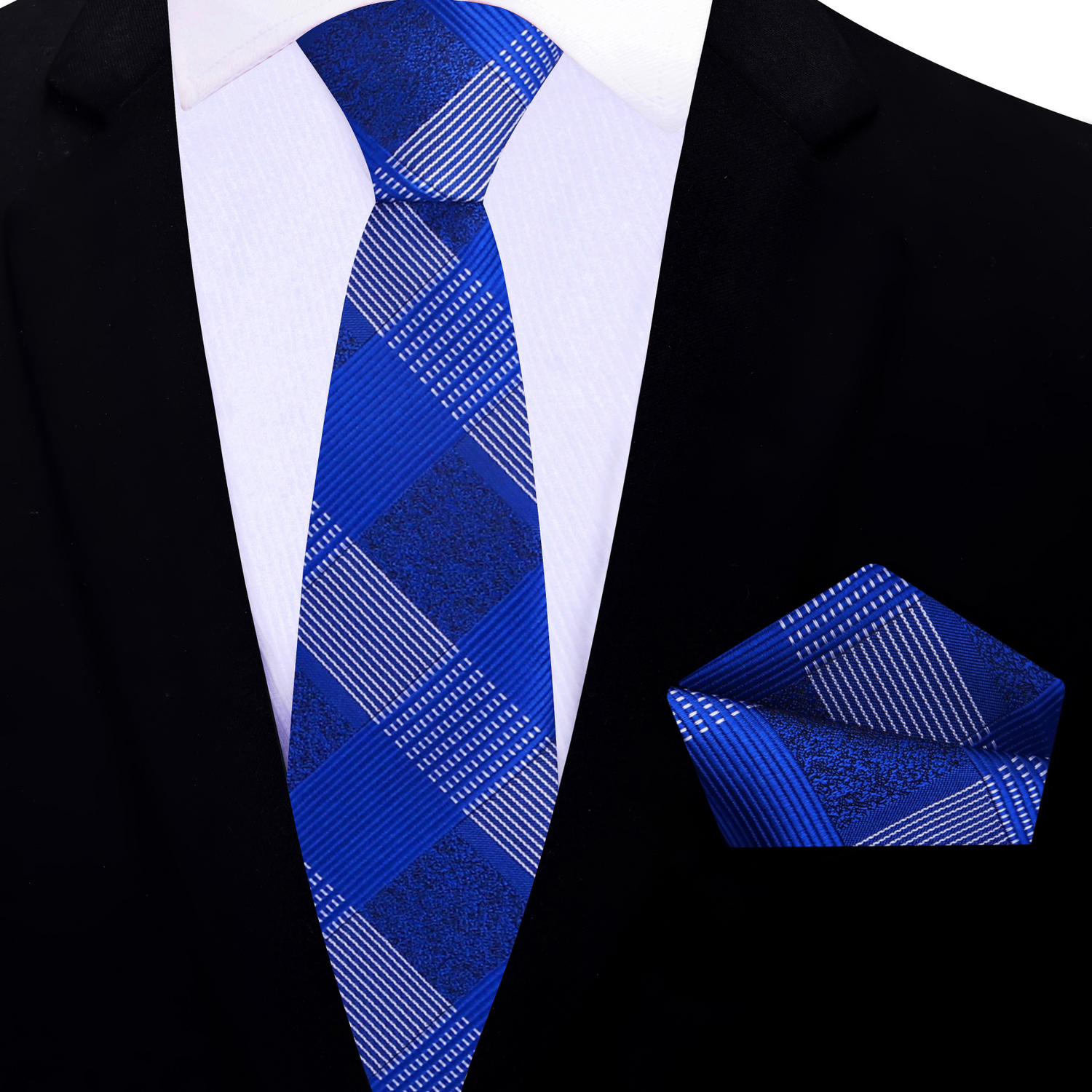 Blue patterned plaid thin tie and matching pocket square on a black suit jacket.