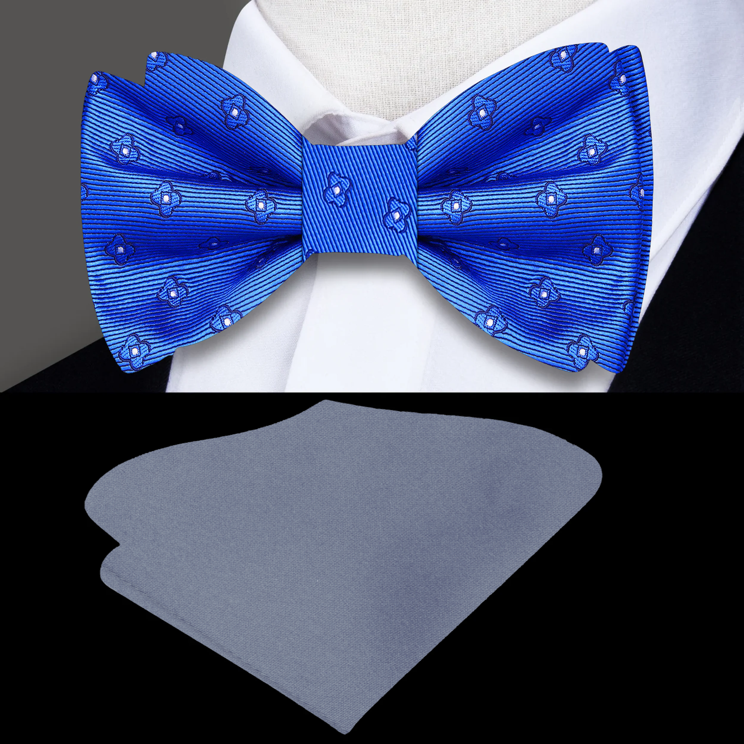Blue bow tie with floral pattern and grey pocket square on a black background