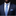 Man wearing a navy suit with a blue patterned tie and pocket square on a dark background