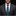Man wearing a gray suit with a blue and green plaid tie and pocket square on a black background