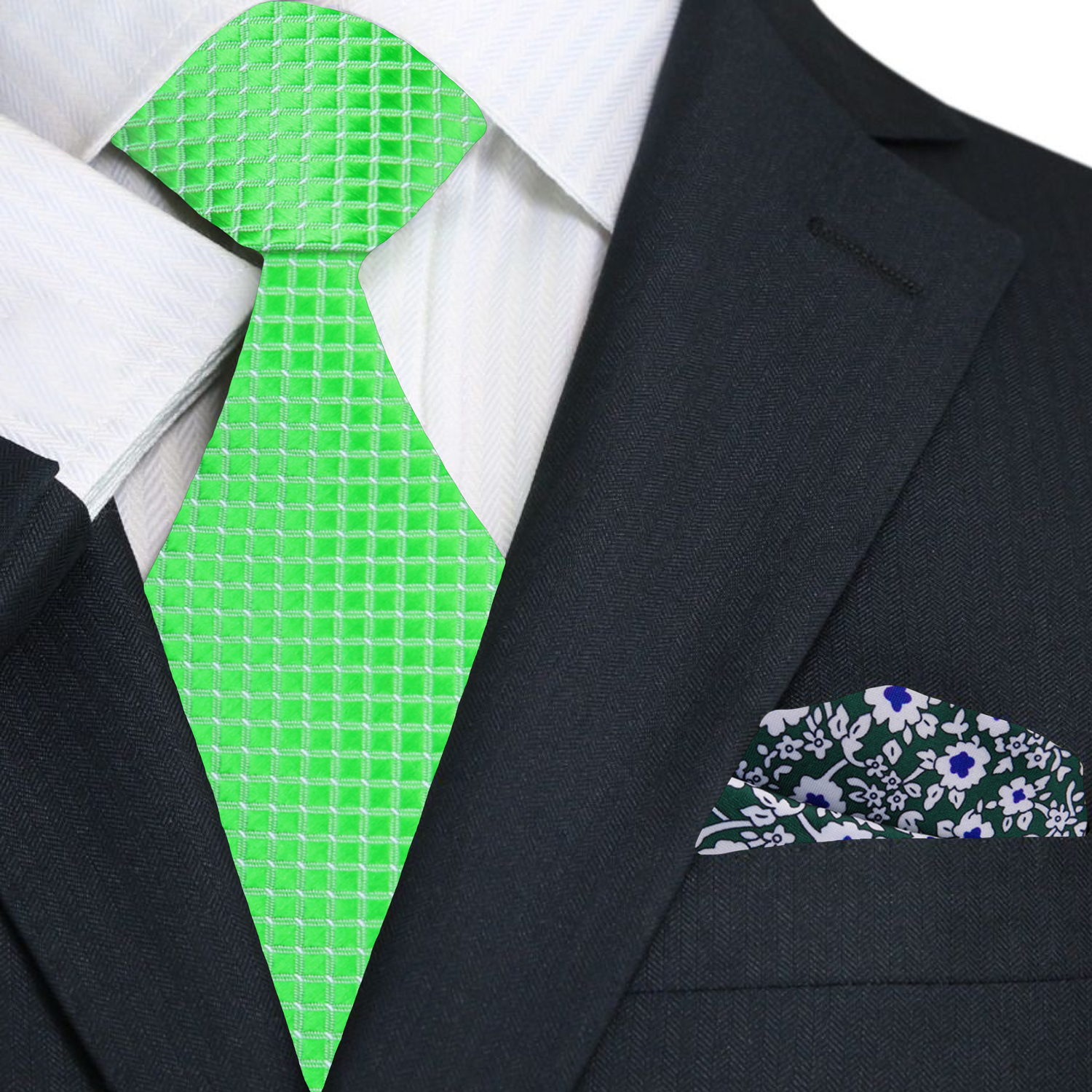 Green patterned tie and floral pocket square on a suit jacket