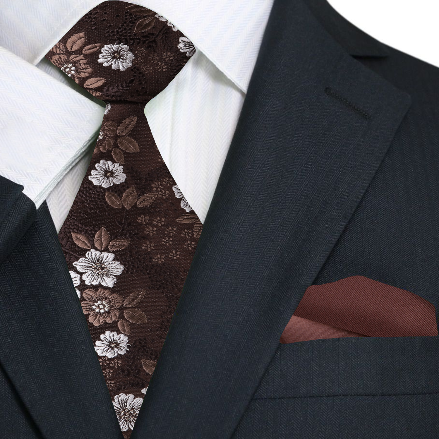Floral-patterned tie on a suit with a matching pocket square.