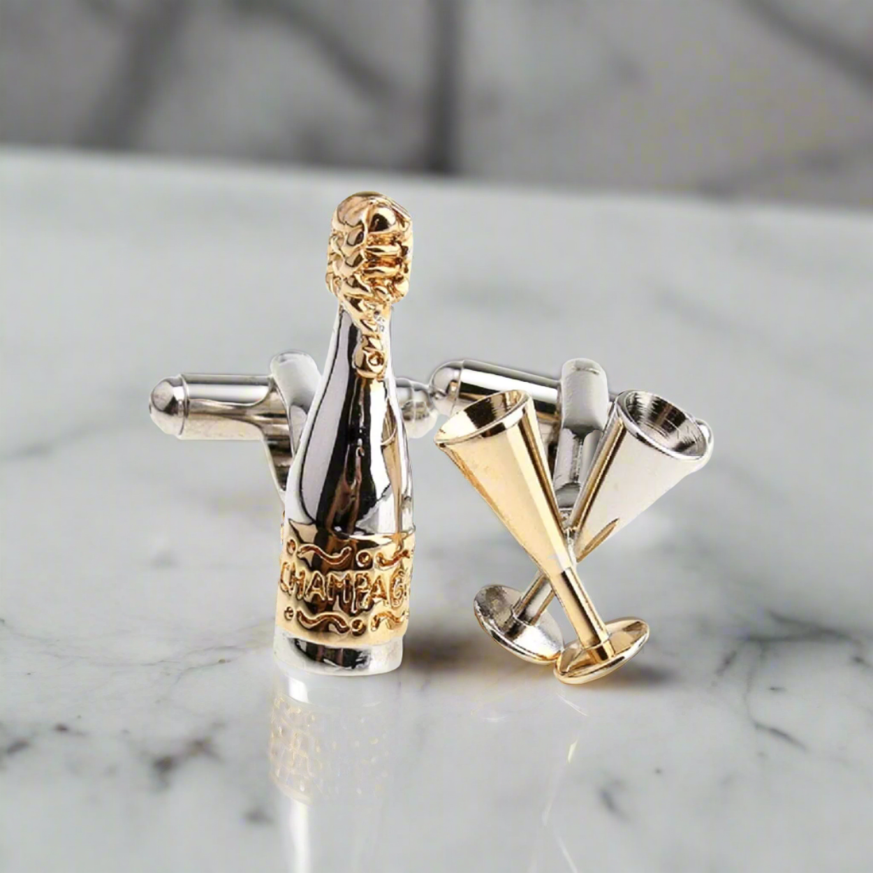 View 2 A Chrome and Gold Champagne Bottle and Champagne Cups Shaped Cuff links.