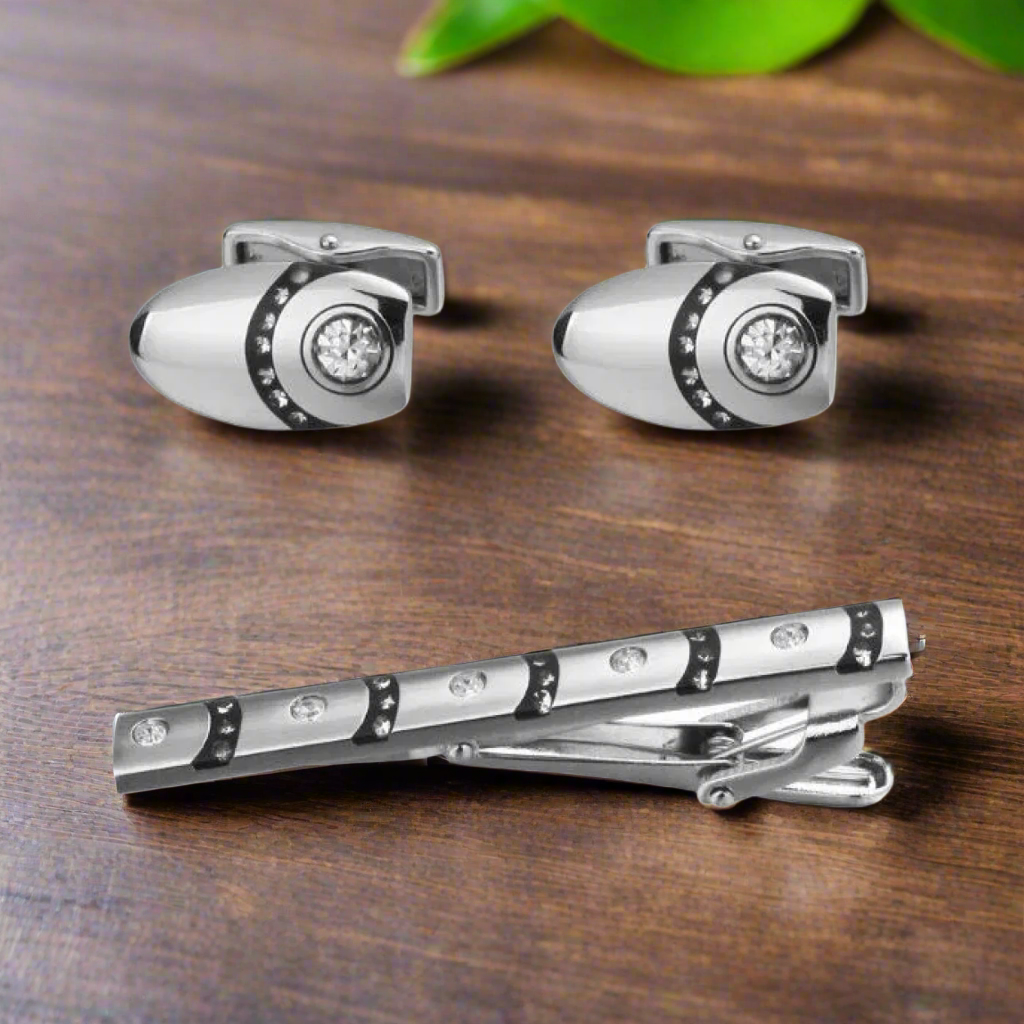 chrome and black tie clip and cufflinks