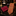 A men's necktie with a rust-orange and brown herringbone pattern, displayed next to a matching folded pocket square in deep burgundy on a polished black marble surface.
