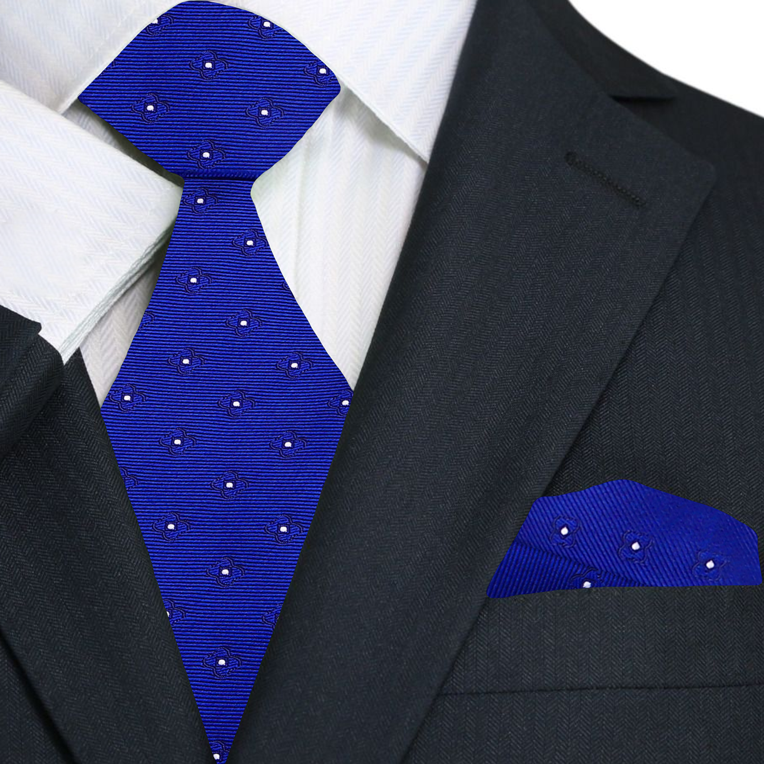 Blue patterned tie and matching pocket square on a black suit jacket.