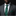 Man wearing a gray suit with a green striped tie and matching pocket square on a black background