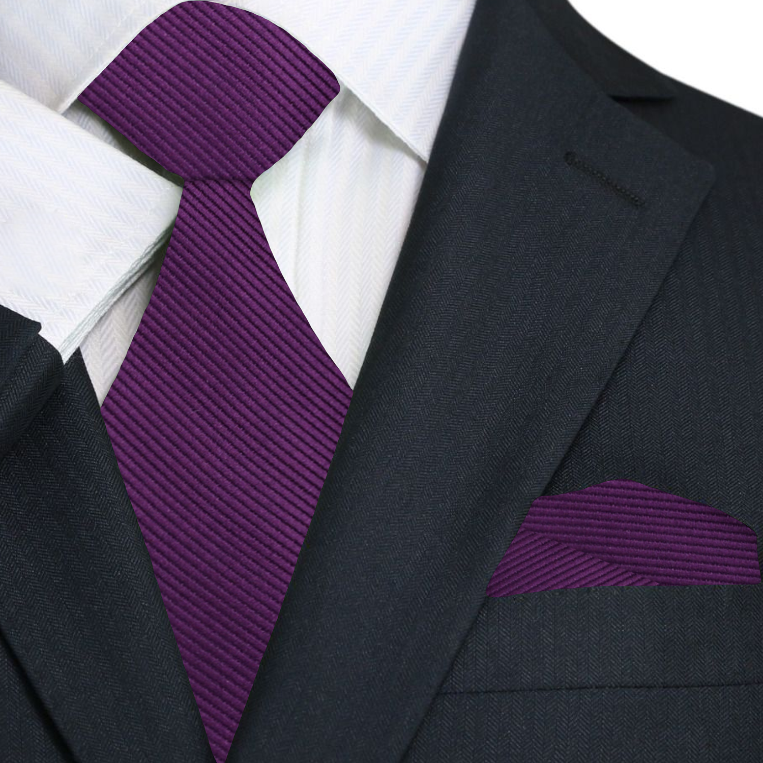 Black suit with a purple tie and pocket square