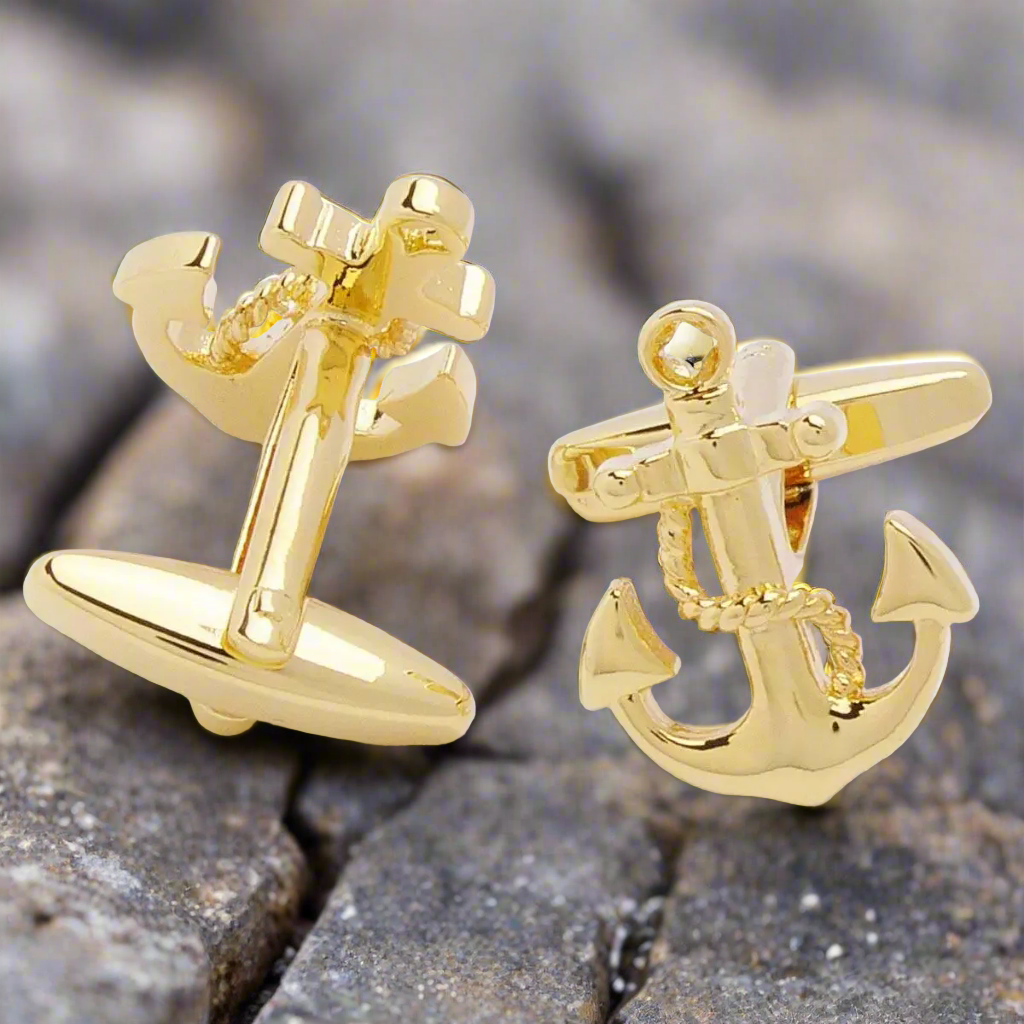 gold cufflinks that are anchors with a rope