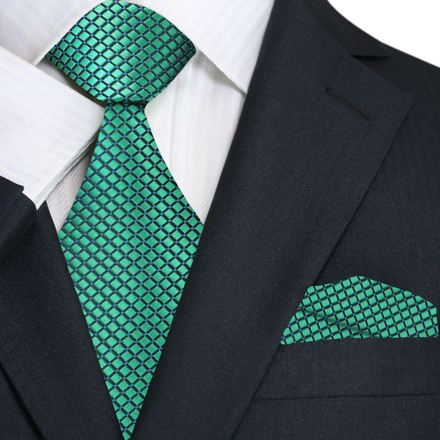Green patterned tie and matching pocket square on a black suit jacket