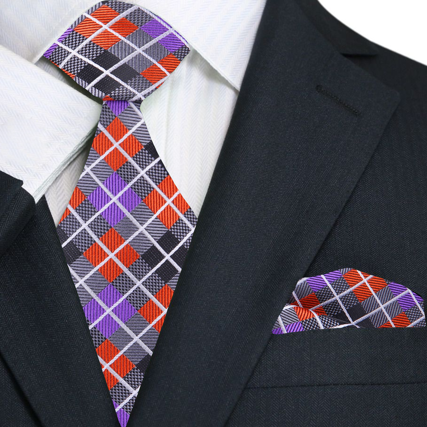 Plaid tie and pocket square set on a suit jacket