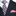 Black suit with a plaid tie and pink pocket square
