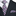 Black suit with a plaid tie and pocket square on a white background