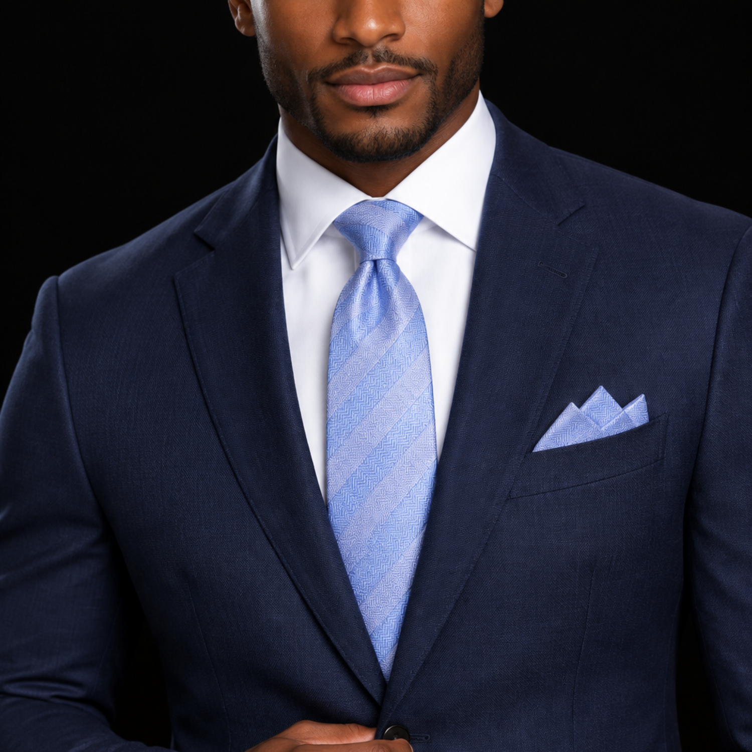 man wearing a blue stripe tie and square