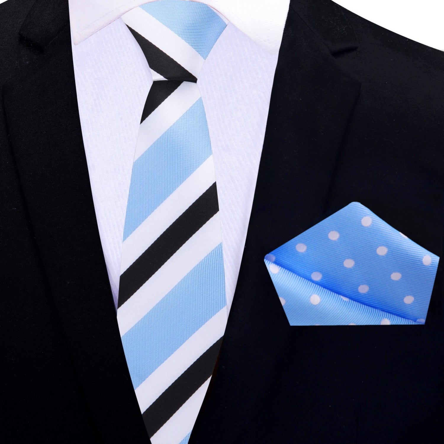 A men's formal accessory set featuring a light blue necktie with black and white diagonal stripes, a matching light blue pocket square with white polka dots, and a white dress shirt tucked into a black suit jacket.