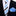 A men's formal accessory set featuring a light blue necktie with black and white diagonal stripes, a matching light blue pocket square with white polka dots, and a white dress shirt tucked into a black suit jacket.